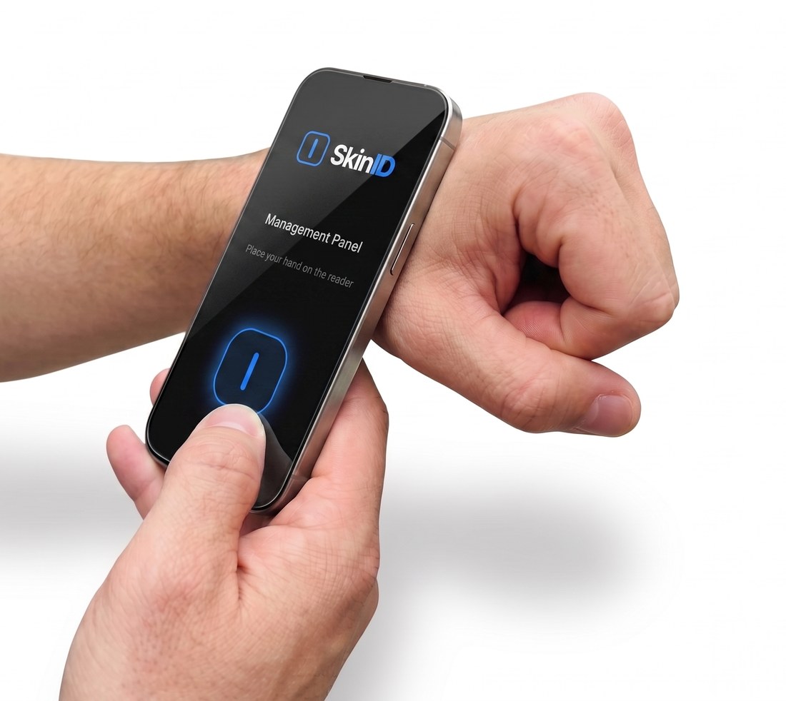 A phone running the SkinID app scanning the implant in a hand